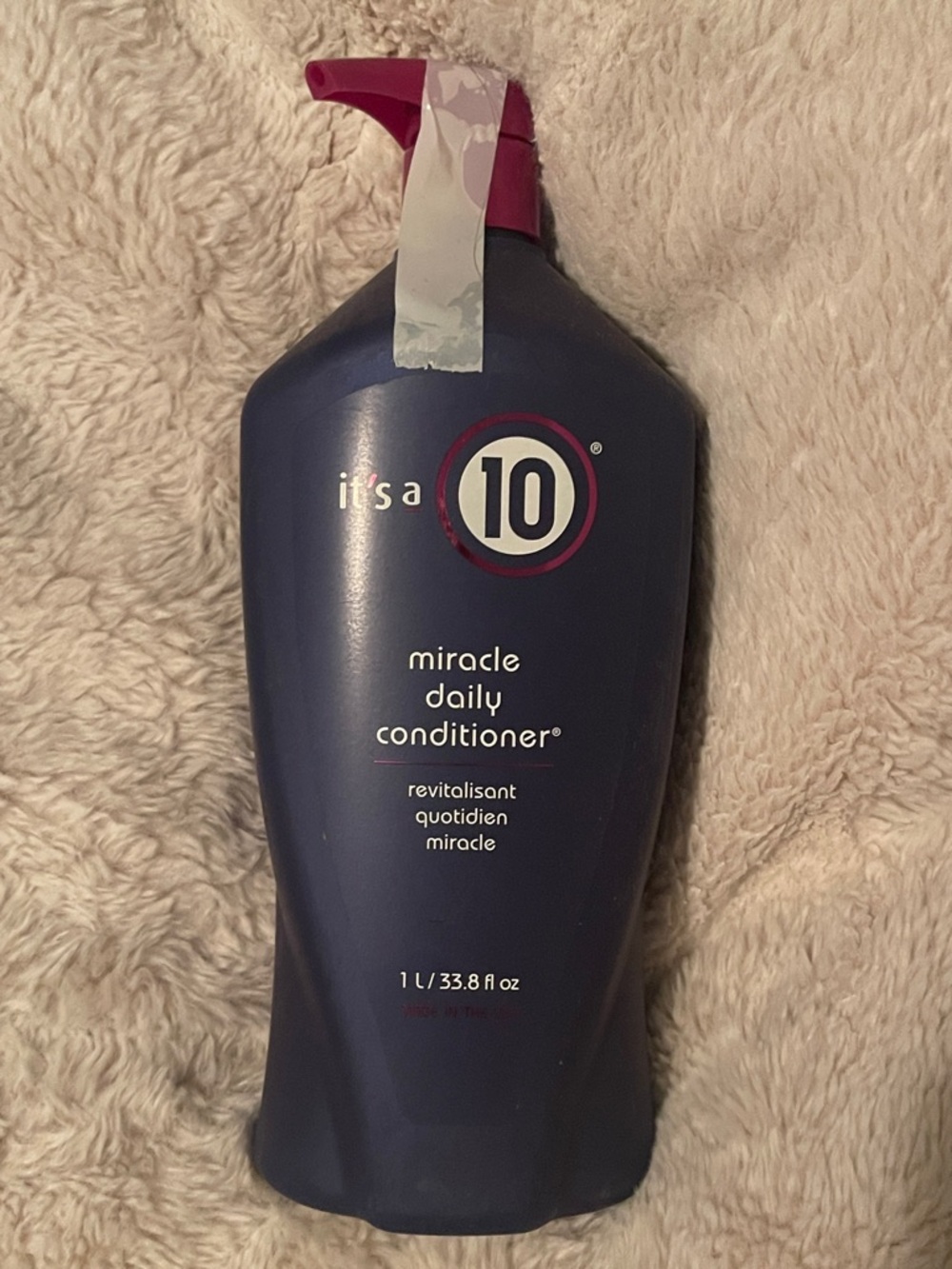 It's a 10 Miracle Daily Conditioner - Navy Bottle with Pink Pump